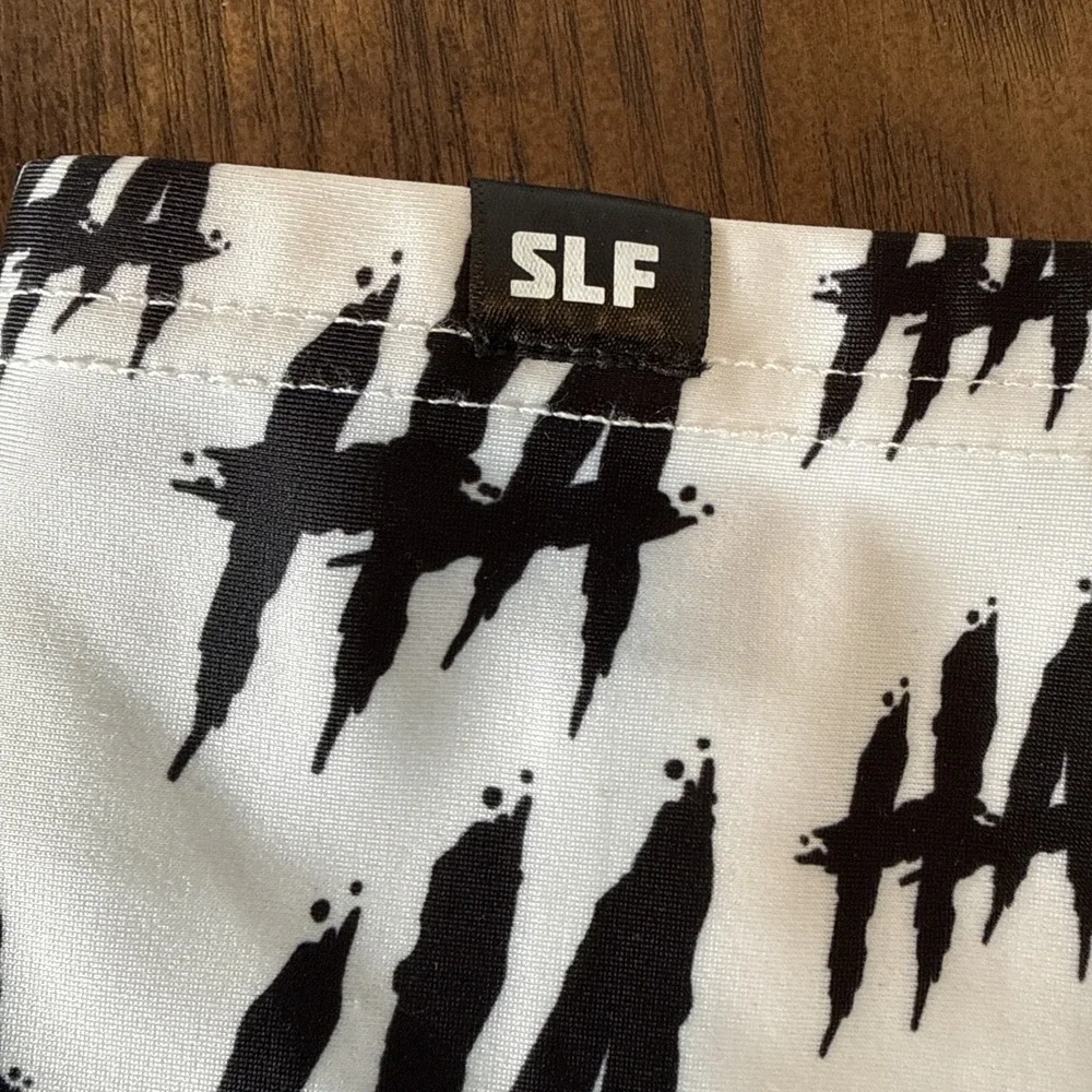 SLEEFS Arm Sleeve Size S/M Black And White HA HA HA Football Baseball